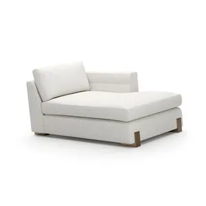 Counter Balance Chaise with low profile, cream fabric upholstery, plush cushions, and oak block feet