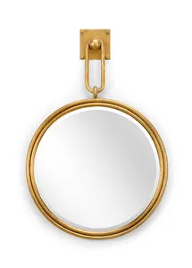 Round beveled mirror with antique gold leaf finish and circular iron frame suspended from a square wall hook