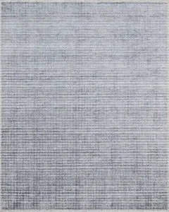 Beverly Denim Rug with hand-loomed rayon and wool pile in minimalist denim blue and gray tones with subtle horizontal texture