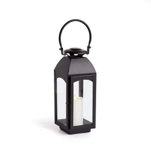 Antoinne Outdoor Lantern in dark black faux zinc with clear glass panels and candle inside