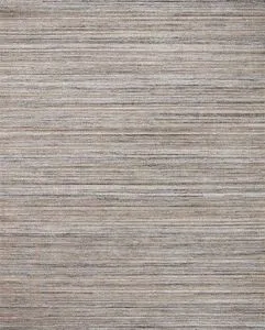 Jamie Natural / Slate Rug in muted gray tones with subtle abrash stripes, hand-loomed texture, rectangular shape