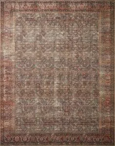 Traditional rug with dense floral patterns in muted reds, browns, and blues with a textured faded effect
