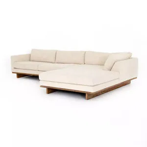 Taupe fabric Everly 2 Piece Sectional with cocoa-finished parawood base and right arm facing chaise