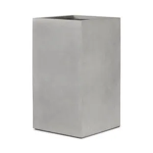 Rectangular monolithic outdoor planter in cast concrete with smooth gray finish
