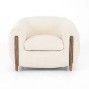 Front view of Lyla Kerbey Ivory Chair highlighting plush seat cushion and curved armrests