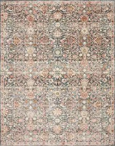 Traditional navy and rust rug with intricate floral and geometric patterns, power-loomed polyester pile