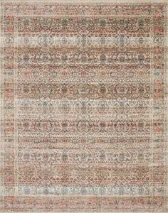 Traditional Saban Sand Rust Rug with intricate floral and geometric polyester pile patterns in warm sand, rust, and blue t...