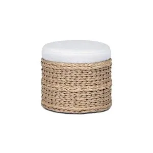 Rowan Outdoor Ottoman with chunky faux banana leaf woven base and thick light beige upholstered round top