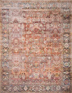 Layla Spice / Marine vintage-style rug with traditional old-world pattern in muted reds, blues, and cream tones