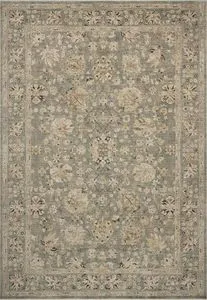 Traditional Briar Dune Mist rug with floral motifs in muted blue, beige, and cream tones with a vintage-style texture