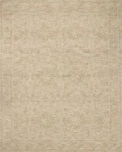 Hand-tufted Penny Collection wool rug in natural tones with ribbed high-low pile and subtle traditional motifs