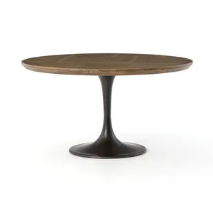 Round Powell Dining Table with black cast-iron tulip base and brass-clad top banded in distressed oak