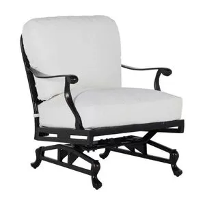 Outdoor lounge chair with black aluminum frame and white cushions featuring curved arms and lattice backrest