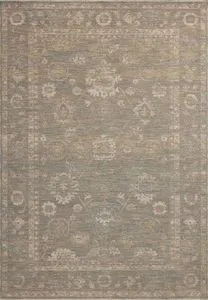 Traditional Louisa Lagoon ivory rug in soft pale blues, creams, and browns with a subtle velvety pile