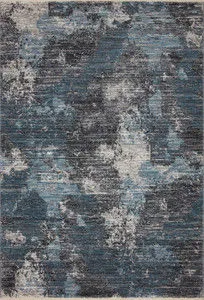 Top-down view of Samra Rug showing full abstract pattern in blue, grey, and cream tones