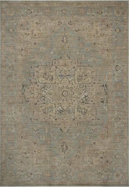 Traditional Briar Sky Grove rug with vintage-style textured pile in soft blue, beige, and subtle accent colors