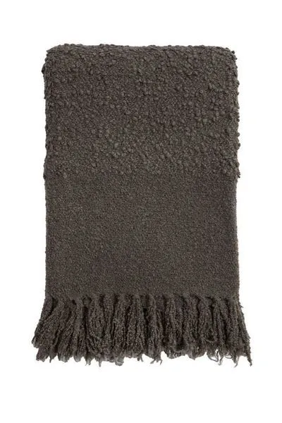 Murphy oversized throw in charcoal gray with plush bouclé texture, curly knots, loops, tassels at edges