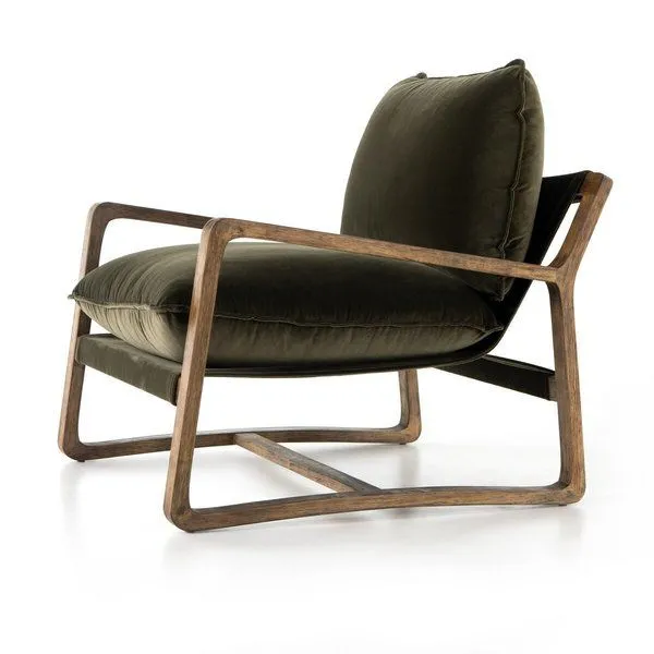 Ace Olive Green Accent Chair with hand-shaped parawood frame and deep, low olive cotton cushions