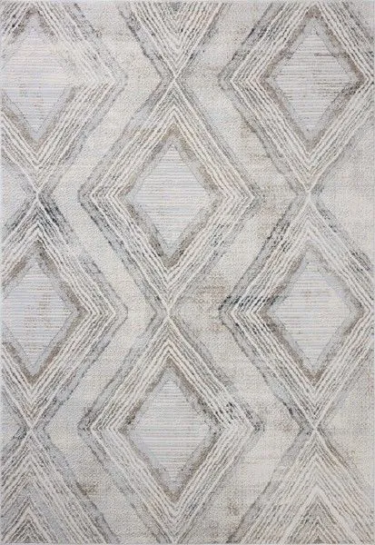 Ivory-toned area rug with classic geometric diamond motifs and fringed edges in neutral shades