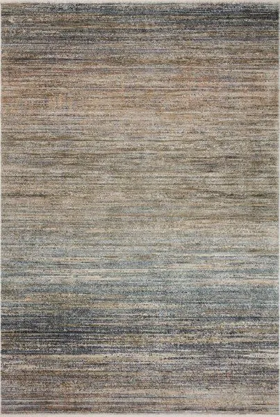 Modern rug with abstract pattern in muted earth, concrete, and pavement tones in shades of beige, gray, and blue.