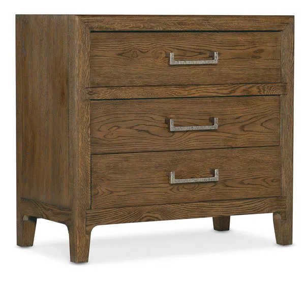 Three-drawer nightstand in warm brown Sorrel finish with visible woodgrain and pewter hardware