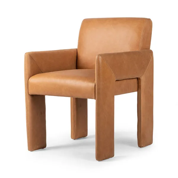 Amur Dining Armchair in tan top-grain leather with structured voluminous seating and squared block legs