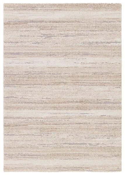 Modern abstract tan, cream, and gray rug with high-low carved texture, 5 by 7 feet 6 inches