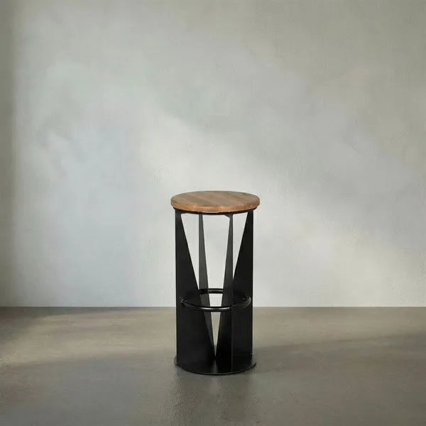 Swivel bar stool with round white oak seat and black iron geometric base with circular footrest