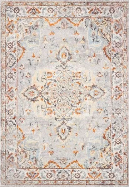 Vintage style rug with intricate symmetrical floral and geometric patterns in grey, ivory, and rust tones