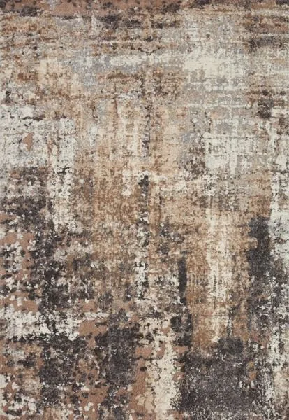 Top view showing rug's distressed abstract design with more beige and light grey tones