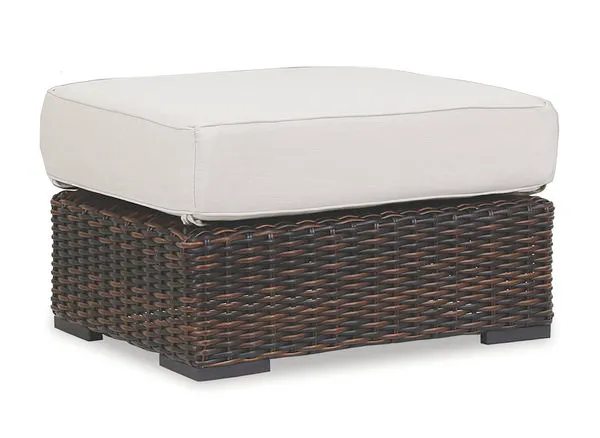 Montecito Ottoman with Cognac multi-colored woven resin wicker base and thick white outdoor cushion