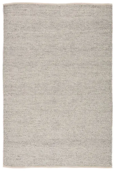 Solid light gray and ivory indoor outdoor area rug with a handwoven heathered texture in a rectangular shape