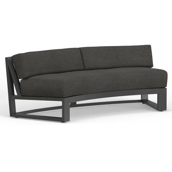 Redondo Curved Sofa with low back and brushed slate powder coated aluminum frame, dark gray cushions