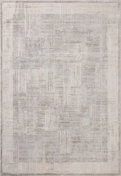 Ivory-toned area rug with subtle geometric motifs and a slightly distressed textured pattern