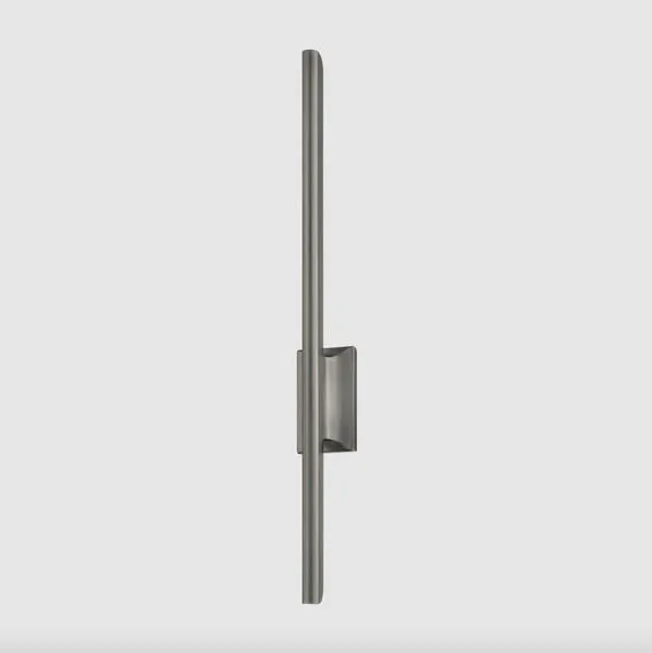 Bernard Wall Sconce against gray background showing matte metal finish and recessed LED lighting