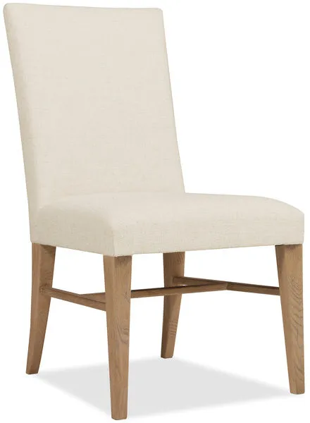 Driftwood Upholstered Side Chair with plush bisque fabric seat and back, oak legs in Buckboard finish with stretcher support
