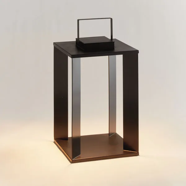 Hanley Solar LED Lantern in matte black metal with square frame and solar panel on top illuminating warm light