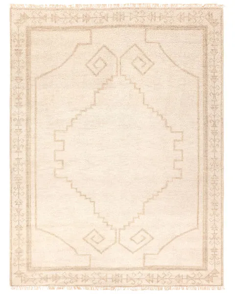 Beige and cream hand knotted rug with an open center medallion, textured border and matching fringe