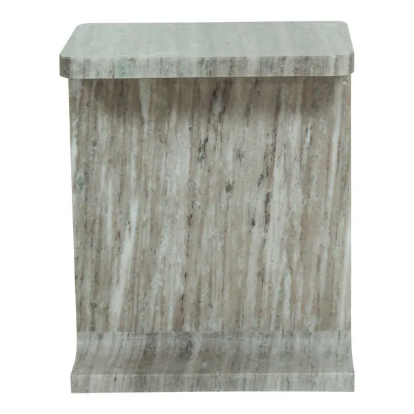 Tullia Accent Table in taupe marble with sculptural I-beam form, smooth polished surface, and rounded top edges
