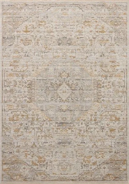 Ivory and ochre vintage-style area rug with faded traditional motifs and neutral grey and beige tones
