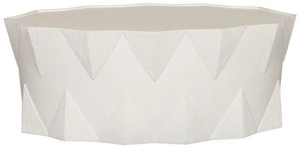 Soleil Oval Cocktail Table with geometric faceted design, bold angular lines, and crisp white finish