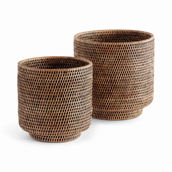 Pair of Burma Rattan Cachepots with tight woven pattern and warm brown finish, different sizes