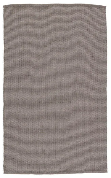 Handwoven solid gray indoor outdoor rug with chunky, heavy polyester weave in dark charcoal hue