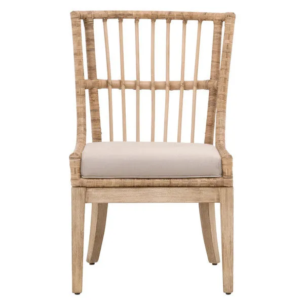 Front view of Playa Dining Chair showing vertical rattan slats and beige cushion