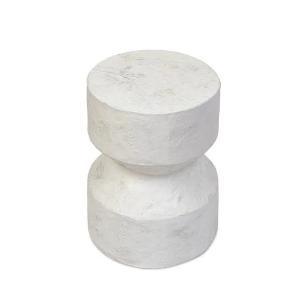 Solid concrete Ara End Table in off-white with a textured surface and hourglass shape