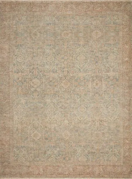 Full top view revealing overall faded and distressed tonal design with soft rust and blue hues