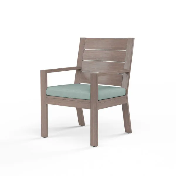 Laguna Dining Chair in driftwood-finish aluminum with mint green seat cushion, armrests, slatted backrest