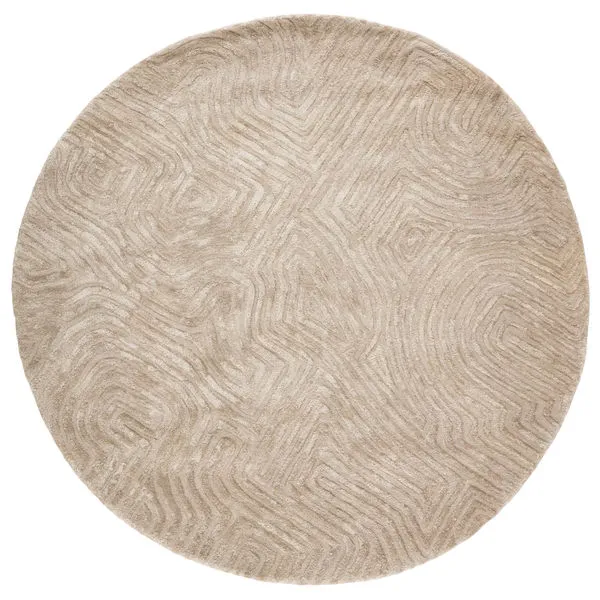 Overhead view of round beige rug showing full abstract labyrinth pattern and soft texture
