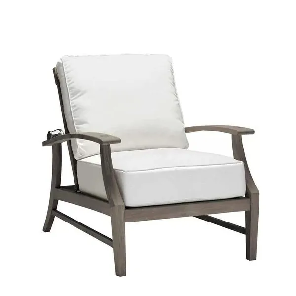 Croquet Teak Recliner Chair with white cushions and warm teak wood frame, featuring curved armrests and slatted design