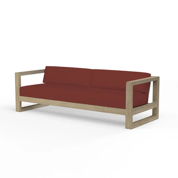 Coastal Teak Sofa with deep seating, solid teak wood frame in warm grey finish and rust-colored cushions